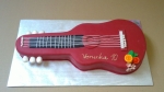 dort červená kytara
